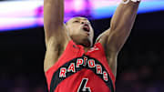 Mar 30, 2025; Philadelphia, Pennsylvania, USA; Toronto Raptors forward Scottie Barnes (4) dunks the ball against the Philadelphia 76ers during the third quarter at Wells Fargo Center. Mandatory Credit: Bill Streicher-Imagn Images