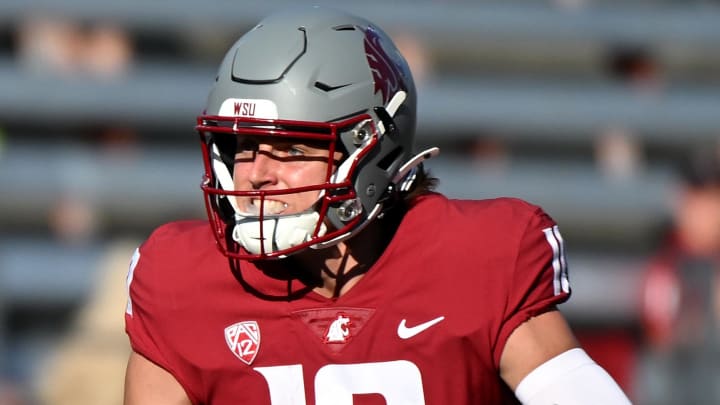 Sep 16, 2023; Pullman, Washington, USA; Washington State Cougars quarterback John Mateer (10) carries the ball against the Northern Colorado Bears in the second half at Gesa Field at Martin Stadium. Mandatory Credit: James Snook-USA TODAY Sports