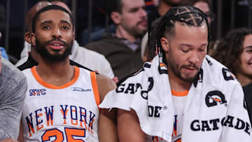 Jan 17, 2025; New York, New York, USA;  New York Knicks forwards Jacob Toppin (00), Mikal Bridges (25) and guard Jalen Brunson (11) at Madison Square Garden. Mandatory Credit: Wendell Cruz-Imagn Images