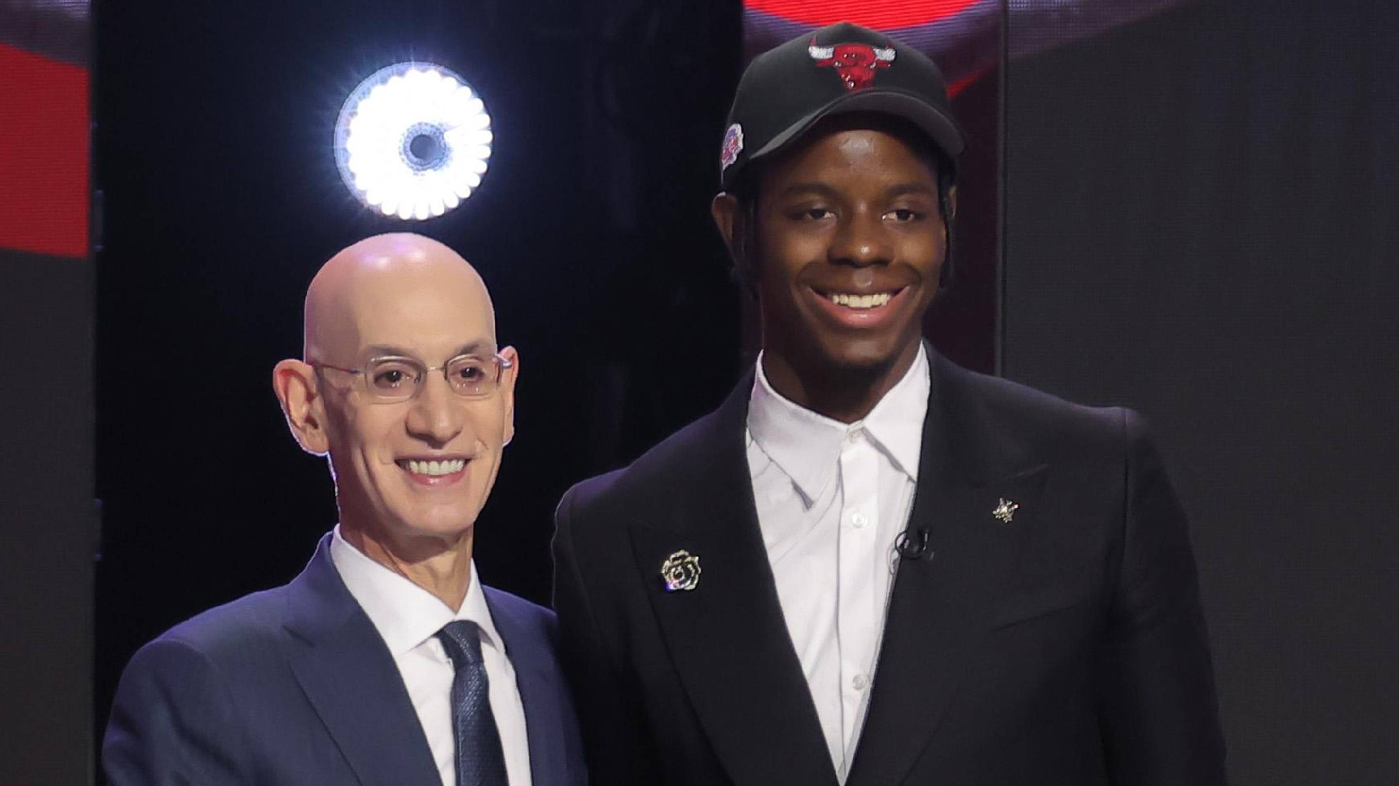 Jun 23, 2026; New York, NY, USA; NBA commissioner Adam Silver greets the fourth pick in the 2026 NBA draft, North Carolina forward Caleb Wilson after he was selected by the Chicago Bulls at Barclays Center. Mandatory Credit: Brad Penner-Imagn Images