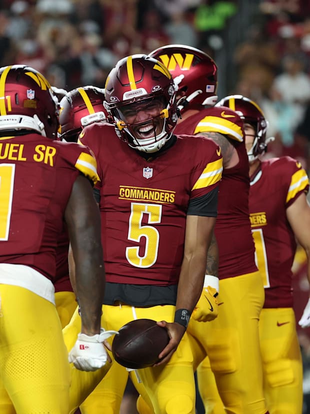 Washington Commanders quarterback Jayden Daniels (5).
