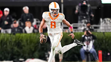 Tennessee quarterback Nico Iamaleava (8) runs with the ball during a college football game between Tennessee and Georgia at Sanford Stadium in Athens, Ga., on Saturday, November 16, 2024.