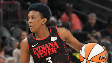 Jun 29, 2022; Phoenix, Arizona, USA; Indiana Fever guard Danielle Robinson (3) dribbles the ball against the Phoenix Mercury during the second half at Footprint Center. Mandatory Credit: Joe Camporeale-Imagn Images