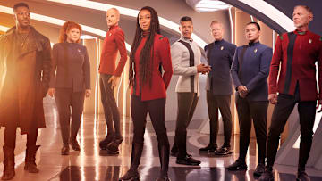 L-R David Ajala as Book, Mary Wiseman as Tilly, Doug Jones as Saru, Sonequa Martin-Green as Burnham, Wilson Cruz as Culber, Blu Del Barrio as Adira and Callum Keith Rennie as Raynor in season 5 of the Paramount+ original series STAR TREK: DISCOVERY. Photo Credit: James Dimmock/Paramount+