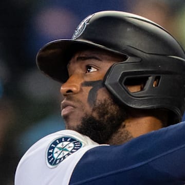 Seattle Mariners right fielder Victor Robles hits a double during a game against the Detroit Tigers on April 2 at T-Mobile Park.
