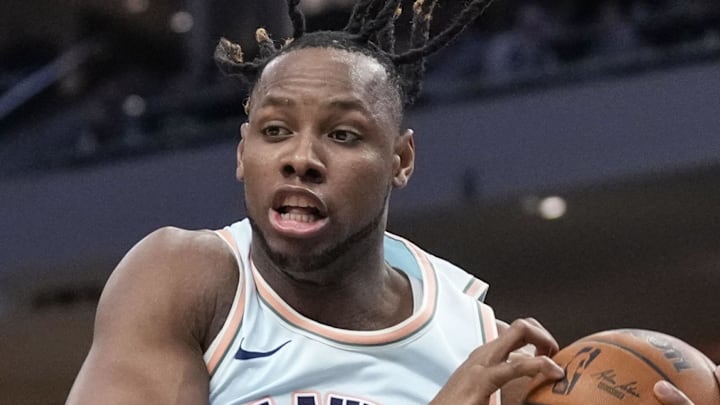 Jan 8, 2025; Milwaukee, Wisconsin, USA;  San Antonio Spurs center Charles Bassey (28) grabs a rebound during the third quarter against the Milwaukee Bucks at Fiserv Forum. Mandatory Credit: Jeff Hanisch-Imagn Images