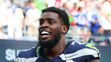 Devon Witherspoon of the Seattle Seahawks smiles