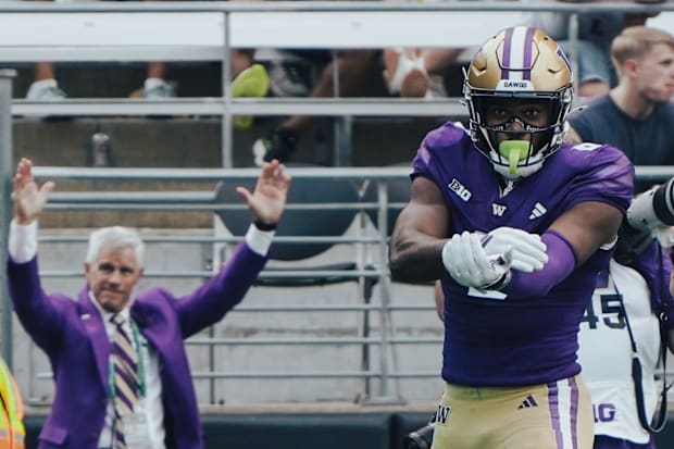 A UW official signals touchdown for Jeremiah Hunter.