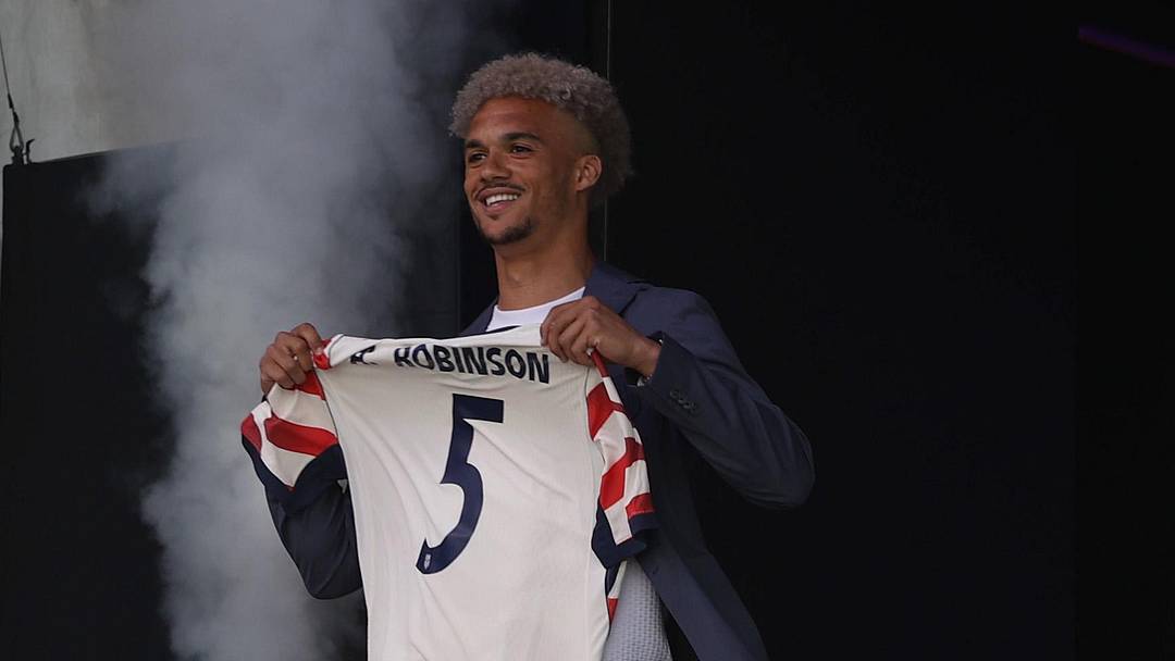 May 26, 2026; New York, New York, USA; Antonee Robinson walks on stage during the United States men's national team roster reveal for the 2026 FIFA World Cup at The Rooftop at Pier 17. Mandatory Credit: Pamela Smith-Imagn Images
