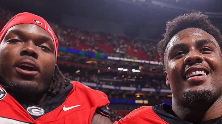 Georgia Bulldogs defensive lineman Christen Miller celebrates after a victory