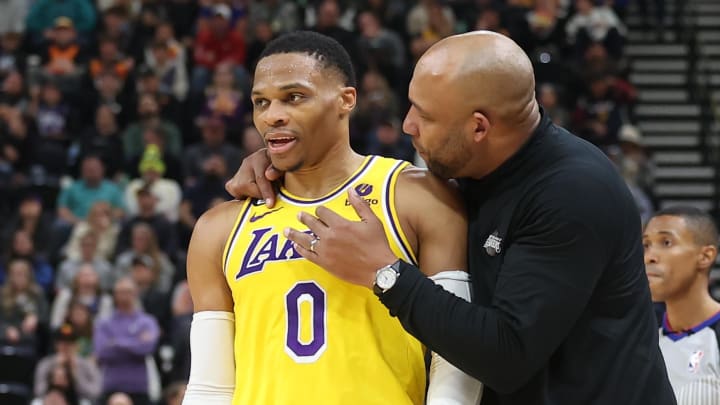 Nov 7, 2022; Salt Lake City, Utah, USA; Los Angeles Lakers head coach Darvin Ham speaks with guard Russell Westbrook (0) against the Utah Jazz in the second quarter at Vivint Arena. 