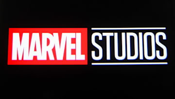 In this photo illustration a Marvel Studios logo is seen on...