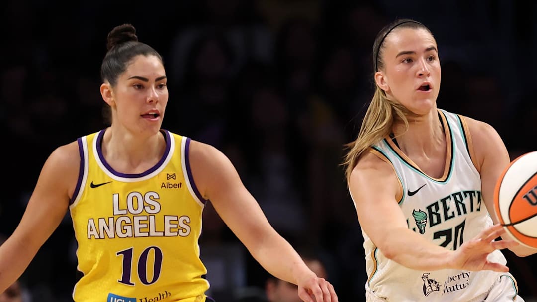 Aug 12, 2025; Los Angeles, California, USA;  New York Liberty guard Sabrina Ionescu (20) passes the ball during the second quarter against the Los Angeles Sparks at Crypto.com Arena. Mandatory Credit: Kiyoshi Mio-Imagn Images