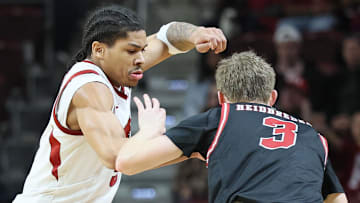 Arkansas Razorbacks guard Darius Acuff Jr (5) defends during the second half against Fresno State Bulldogs guard Jake Heidbreder (3) at Simmons Bank Arena in North Little Rock, Ark.