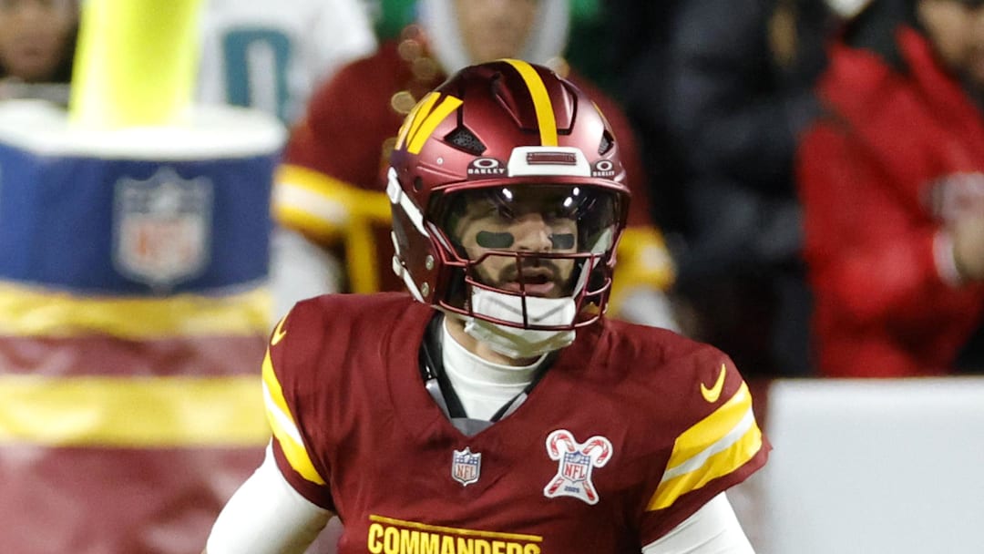 Washington Commanders quarterback Marcus Mariota looks to pass against the Philadelphia Eagles.