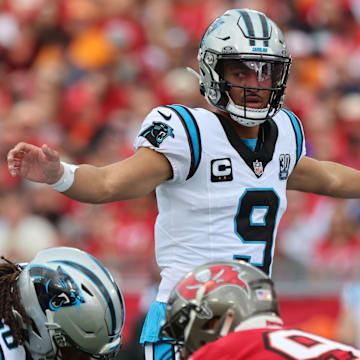Dec 29, 2024; Tampa, Florida, USA; Carolina Panthers quarterback Bryce Young (9) calls a play against the Tampa Bay Buccaneers during the first quarter at Raymond James Stadium. 