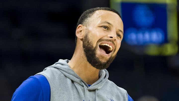 Oct 8, 2025; San Francisco, California, USA;  Golden State Warriors guard Stephen Curry (30) reacts as he warms up before the game against the Portland Trail Blazers at Chase Center. Mandatory Credit: John Hefti-Imagn Images