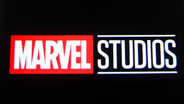 In this photo illustration a Marvel Studios logo is seen on...