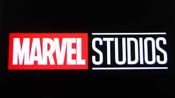 In this photo illustration a Marvel Studios logo is seen on...