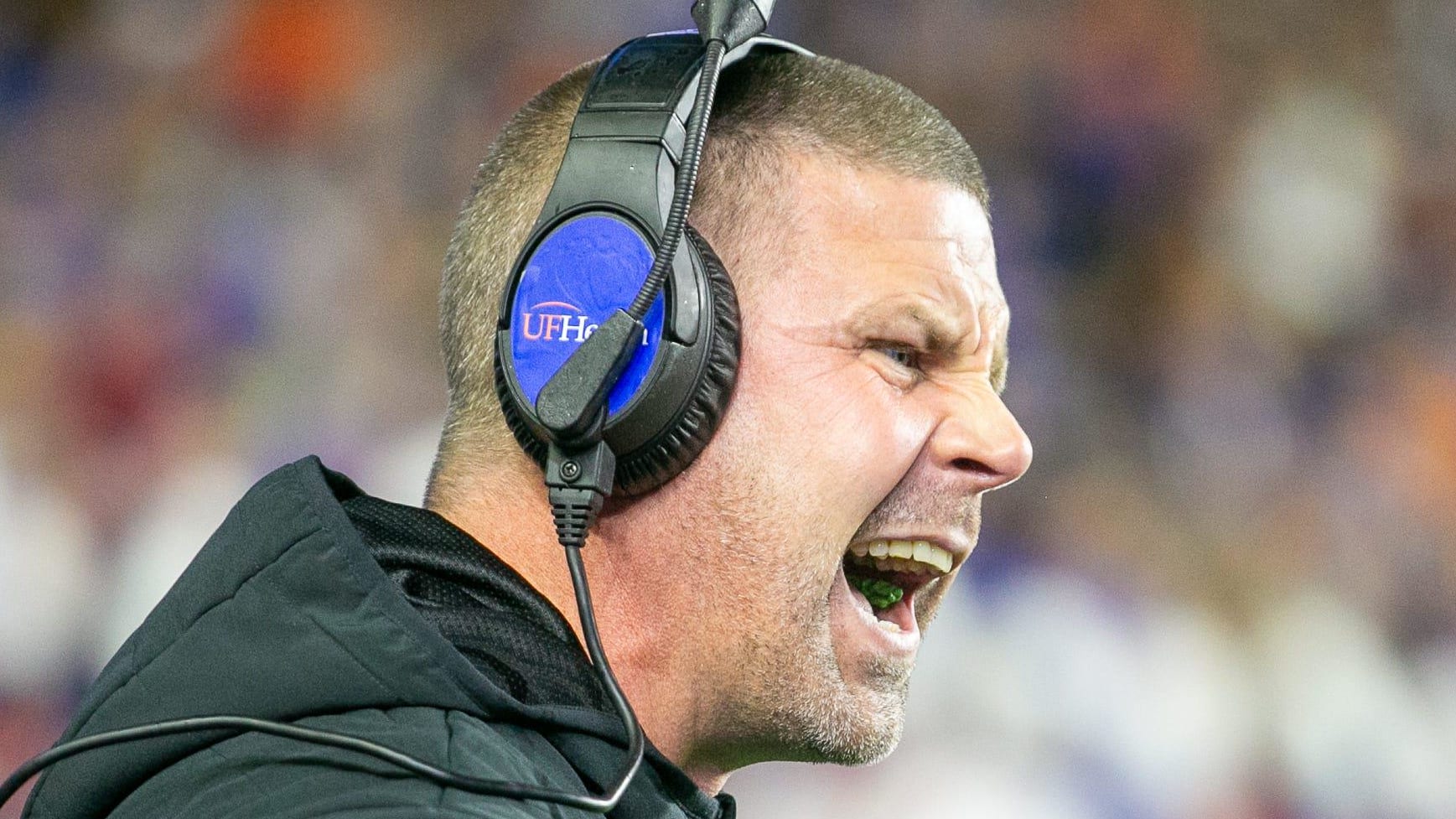 Florida Gators head coach Billy Napier yells at officials during a college football game in the SEC.