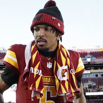 Washington Commanders quarterback Jayden Daniels (5) stands on the field after the Commanders' game against the Philadelphia Eagles at Northwest Stadium. 