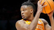 Houston Cougars guard Emanuel Sharp (21) guards Tennessee Volunteers guard Chaz Lanier (2) during the first half of a game Sunday, March 30, 2025, during the Elite Eight round of the NCAA March Madness tournament at Lucas Oil Stadium in Indianapolis. Houston defeated Tennessee 69-50.