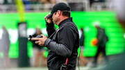 Michigan State's head coach Jonathan Smith adjusts his hat on the sideline during the fourth quarter in the game against UCLA on Saturday, Oct. 11, 2025, at Spartan Stadium in East Lansing.