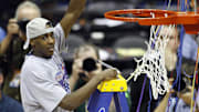 Apr 7, 2008; San Antonio, TX, USA; Kansas Jayhawks guard Mario Chalmers (15) holds up a piece of the net after defeating the Memphis Tigers in the finals of the 2008 NCAA Mens Final Four Championship at the Alamodome.  Kansas defeated Memphis 75-68 in overtime to win the national championship. Mandatory Credit: Bob Donnan-Imagn Images