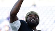 Oct 26, 2025; Baltimore, Maryland, USA; Baltimore Ravens quarterback Tyler Huntley (5) celebrates while leaving the field after the game against the Chicago Bears at M&T Bank Stadium. Mandatory Credit: Geoff Burke-Imagn Images