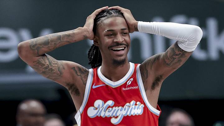 Mar 7, 2025; Dallas, Texas, USA;  Memphis Grizzlies guard Ja Morant (12) reacts against the Dallas Mavericks during the second half at American Airlines Center. Mandatory Credit: Kevin Jairaj-Imagn Images