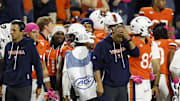 Oct 18, 2025; Charlottesville, Virginia, USA; Virginia Cavaliers head coach Tony Elliott (M) reacts on the sidelines prior to the final play of the game against the Washington State Cougars at Scott Stadium. Mandatory Credit: Geoff Burke-Imagn Images