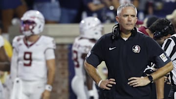 Sep 26, 2025; Charlottesville, Virginia, USA; Florida State Seminoles head coach Mike Norvell looks on during a stoppage in play against the Virginia Cavaliers at Scott Stadium. Mandatory Credit: Geoff Burke-Imagn Images
