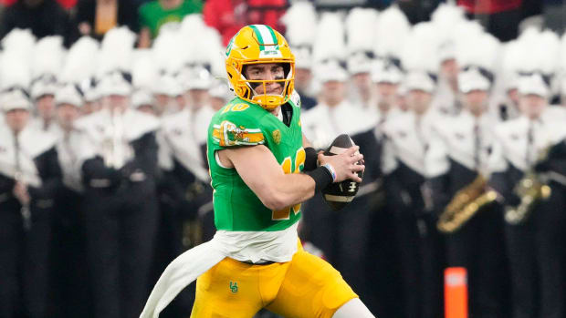 An explosive runner who has made tremendous strides as a passer at Oregon, Bo Nix could potentially sneak into the first round in a deep quarterback class.