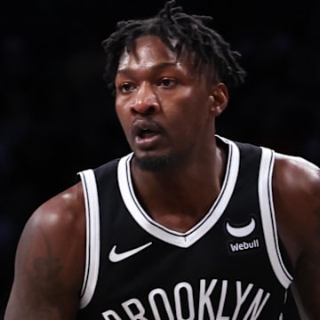 Mar 31, 2024; Brooklyn, New York, USA; Brooklyn Nets forward Dorian Finney-Smith (28) looks to pass during the second half against the Los Angeles Lakers at Barclays Center. Mandatory Credit: Vincent Carchietta-Imagn Images