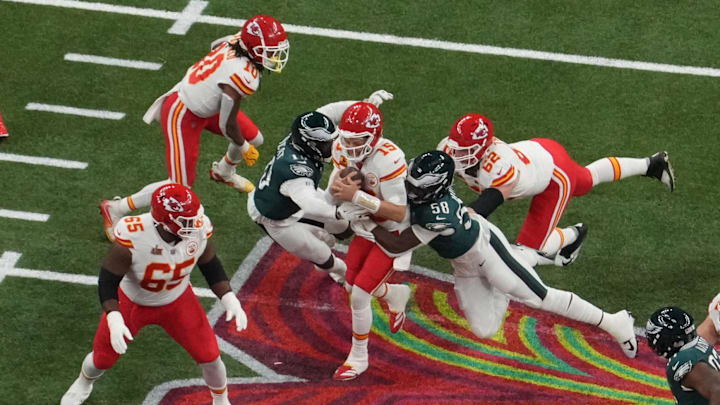 Kansas City Chiefs QB Patrick Mahomes (15) is sacked by Philadelphia Eagles LB Josh Sweat (19) and LB Jalyx Hunt (58) during Super Bowl LIX Kansas City Chiefs QB Patrick Mahomes (15) is sacked by Philadelphia Eagles LB Josh Sweat (19) and LB Jalyx Hunt (58) during Super Bowl LIX