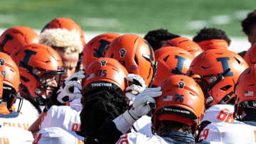 Nov 14, 2020; Piscataway, New Jersey, USA; Illinois Fighting Illini offensive lineman Brevyn Jones (76) huddles with teammates before their game against the Rutgers Scarlet Knights at SHI Stadium. Mandatory Credit: Vincent Carchietta-USA TODAY Sports