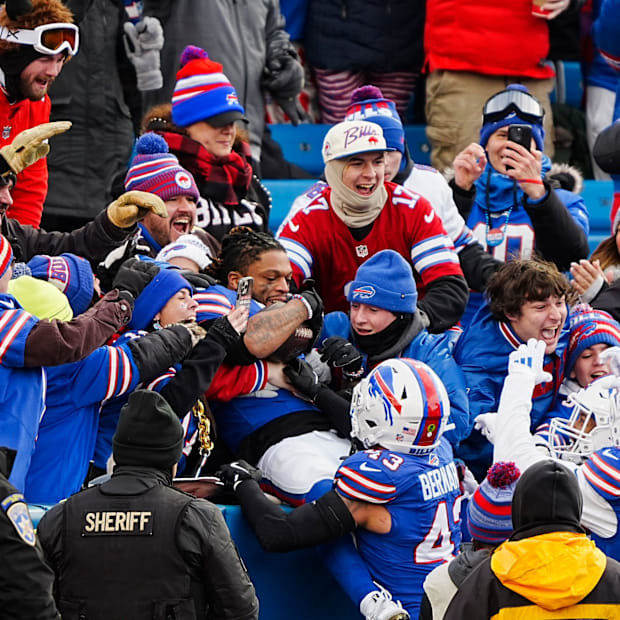 Damar Hamlin celebrates with the fans