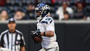 Oct 20, 2024; Atlanta, Georgia, USA; Seattle Seahawks cornerback Coby Bryant (8) intercepts a pass intended for Atlanta Falcons tight end Kyle Pitts (8) in the fourth quarter at Mercedes-Benz Stadium. Mandatory Credit: Brett Davis-Imagn Images