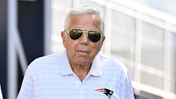 Jul 23, 2025; Foxborough, MA, USA; New England Patriots owner Robert Kraft and his wife Dr. Dana Blumberg bring their dog Heisman to training camp at Gillette Stadium. Mandatory Credit: Eric Canha-Imagn Images