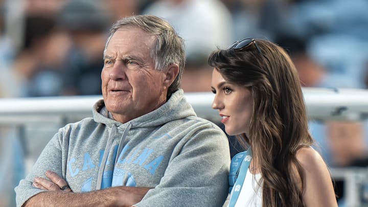 Bill Belichick and Jordon Hudson chatted on the sideline before UNC lost to TCU. Bill Belichick and Jordon Hudson chatted on the sideline before UNC lost to TCU.