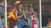 Taylor Swift and Donna Kelce watch the action during the second half between the Baltimore Ravens and the Kansas City Chiefs at GEHA Field at Arrowhead Stadium. 