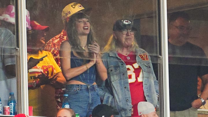 Taylor Swift and Donna Kelce watch the action during the second half between the Baltimore Ravens and the Kansas City Chiefs at GEHA Field at Arrowhead Stadium. 