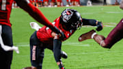 Sep 27, 2025; Raleigh, North Carolina, USA;  Virginia Tech Hokies running back Marcellous Hawkins (27) makes a touchdown during the first half of the game against North Carolina State Wolfpack at Carter-Finley Stadium. Mandatory Credit: Jaylynn Nash-Imagn Images