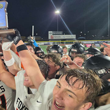 The Silverton football team celebrates after its 24-14 victory over Summit to win the Class 5A state championship Friday night.