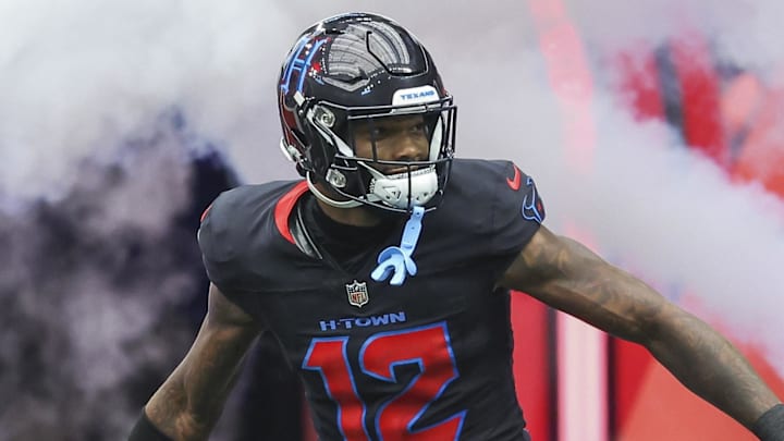 Oct 6, 2024; Houston, Texas, USA; Houston Texans wide receiver Nico Collins (12) is introduced before the game against the Buffalo Bills at NRG Stadium. Mandatory Credit: Troy Taormina-Imagn Images