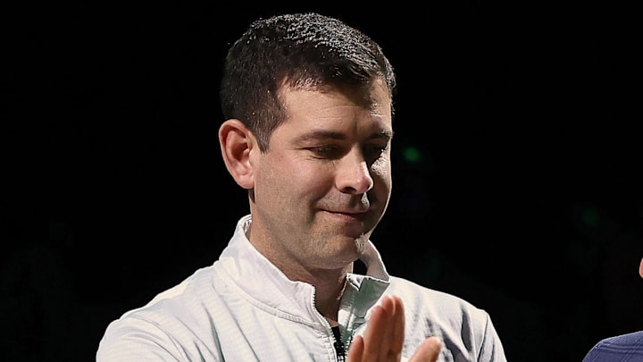 Feb 11, 2026; Boston, Massachusetts, USA; Brad Stevens the president of basketball operations for the Boston Celtics congratulates guard Jaylen Brown (7) for receiving the NBA player of the month award for his performance in the month of January before their game against the Chicago Bulls at TD Garden. Mandatory Credit: Winslow Townson-Imagn Images