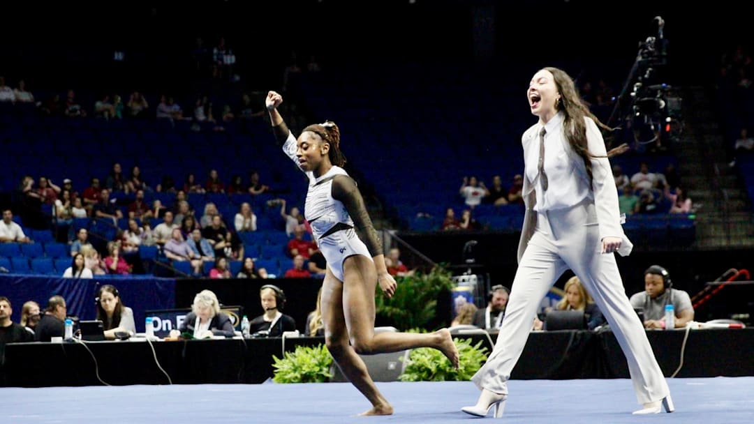 Missouri gymnast Hannah Horton celebrates after her routine at the SEC Championship at the BOK Center in Tulsa, Oklahoma. Horton won the vault title in Session I with a 9.950.