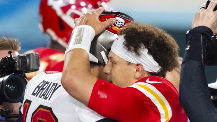 Feb 7, 2021; Tampa, FL, USA;  Tampa Bay Buccaneers quarterback Tom Brady (left) greets Kansas City Chiefs quarterback Patrick Mahomes following Super Bowl LV at Raymond James Stadium.  Mandatory Credit: Mark J. Rebilas-Imagn Images