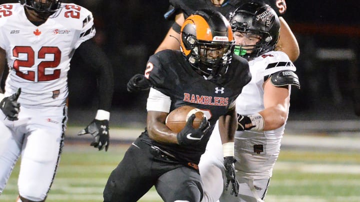 Cathedral Prep senior Dajoure Hollingsworth starts off on a second-half touchdown run against North Clarkson (Canada) at Dollinger Field, Hagerty Family Events Center, in Erie on Sept. 22, 2023.