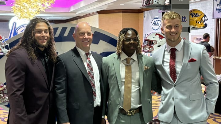 From left to right: Louisville defensive end Ashton Gillotte, head coach Jeff Brohm, Quincy Riley and quarterback Tyler Shough